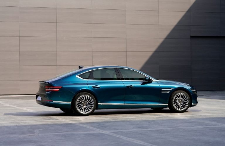 Blue 2022 Genesis Electrified G80 Rear Exterior in a Driveway